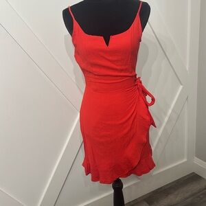 Excellent used condition
Red size small lulus faux wrap skirt mini dress